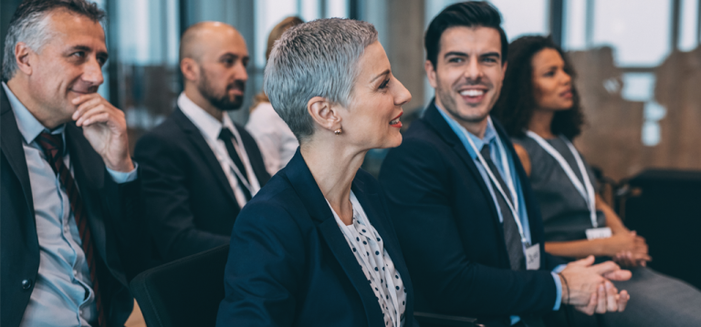 Image of people attending a conference